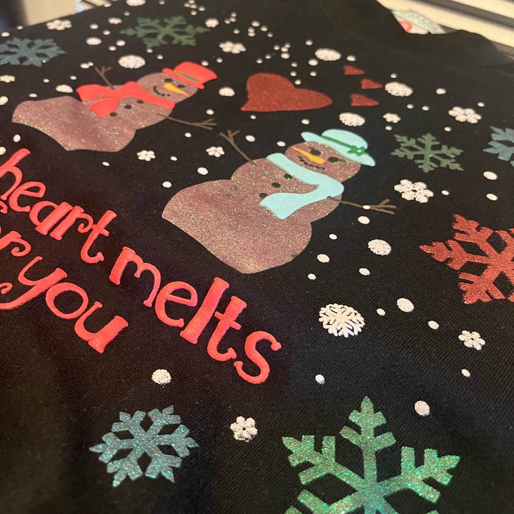 Charming Black Sweater with Snowman and Heart Design